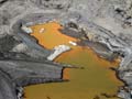 but_they_dont_compare_to_the_deep_orange_of_this_oil_sand_pit_we_pass_in_the_plane_moments_later