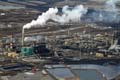raw_oil_called_bitumen_in_a_process_called_coking_and_produces_the_smoke_that_hovers_about_the_whole_area