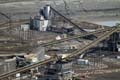 the_conveyors_take_the_sand_to_be_conditioned_the_first_step_in_separating_it_from_the_oil