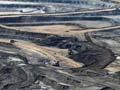 to_make_real_money_in_the_oil_sands_where_creating_synthetic_crude_begins_in_the_strip_mine